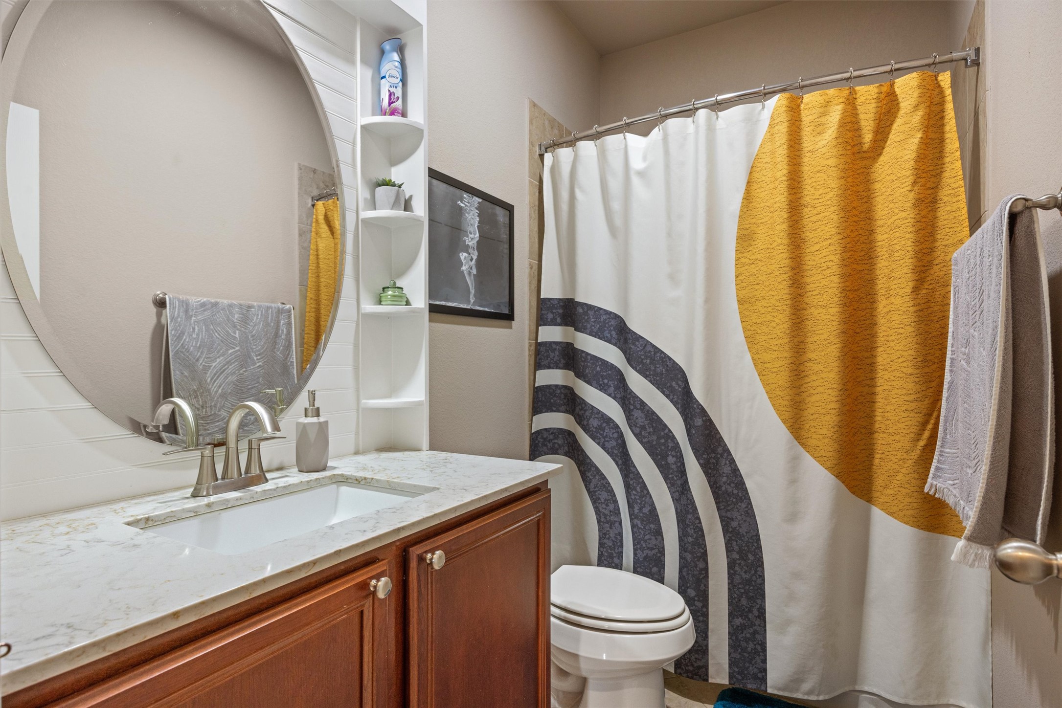 1117 Nevarez Kyle, TX 78640 - Photo 17 of 32 a bathroom with a sink a toilet and a mirror