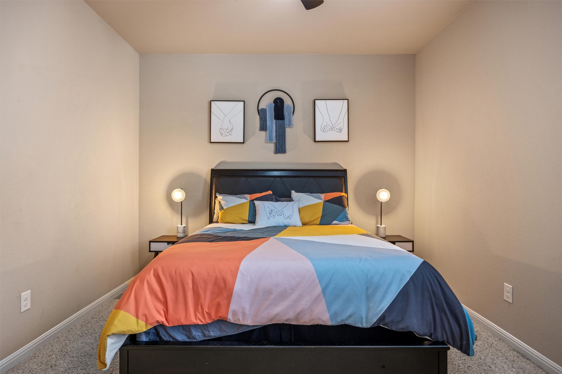 1117 Nevarez Kyle, TX 78640 - Photo 19 of 32 a bedroom with a bed and a night stand