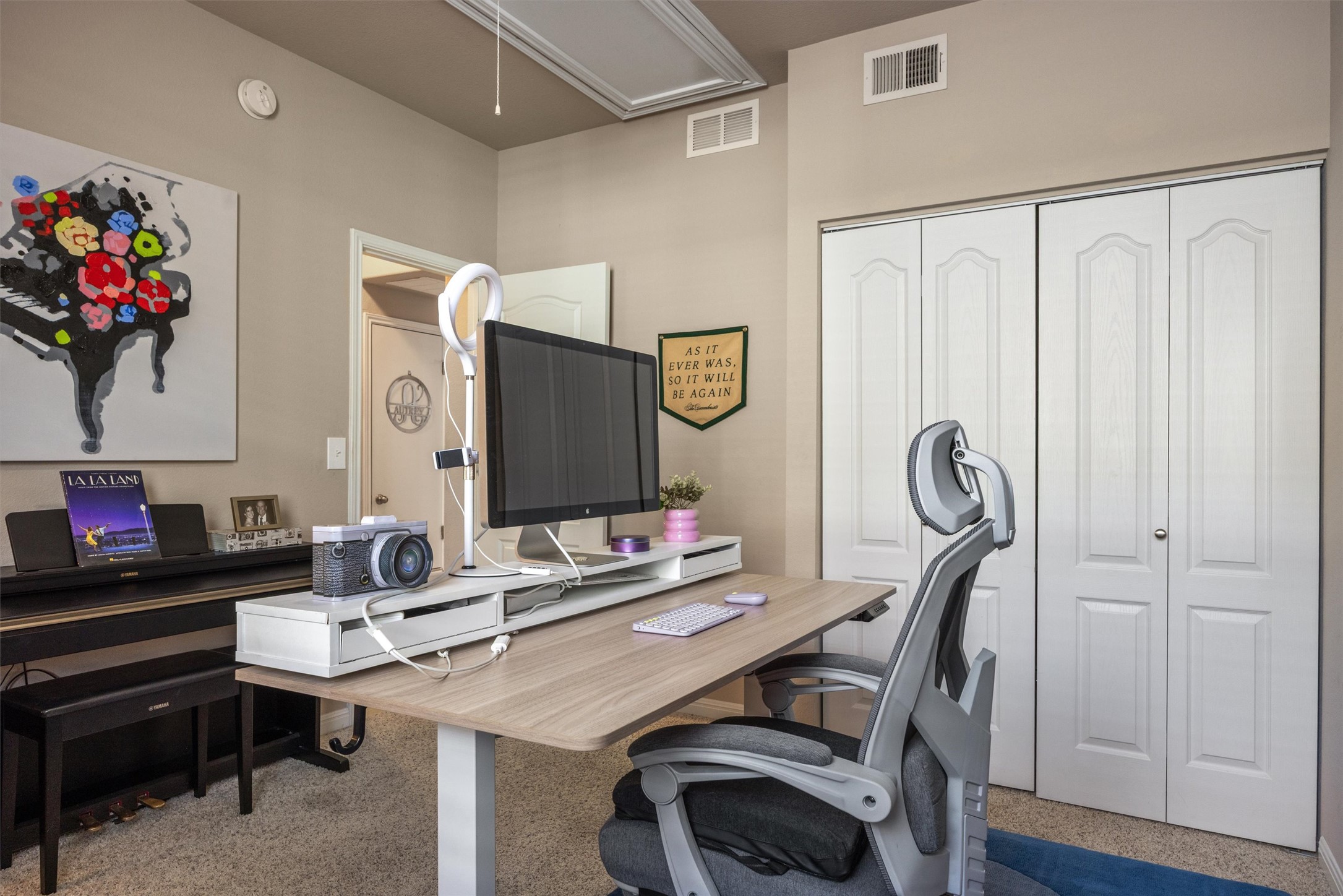 1117 Nevarez Kyle, TX 78640 - Photo 21 of 32 a view of a workspace with furniture and a window