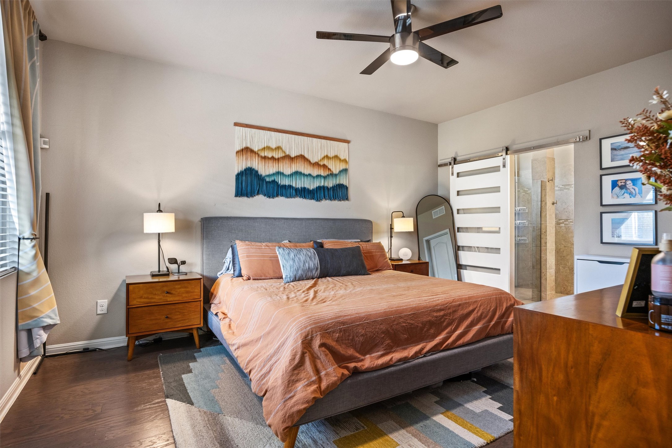 1117 Nevarez Kyle, TX 78640 - Photo 23 of 32 a bedroom with a bed and a flat screen tv