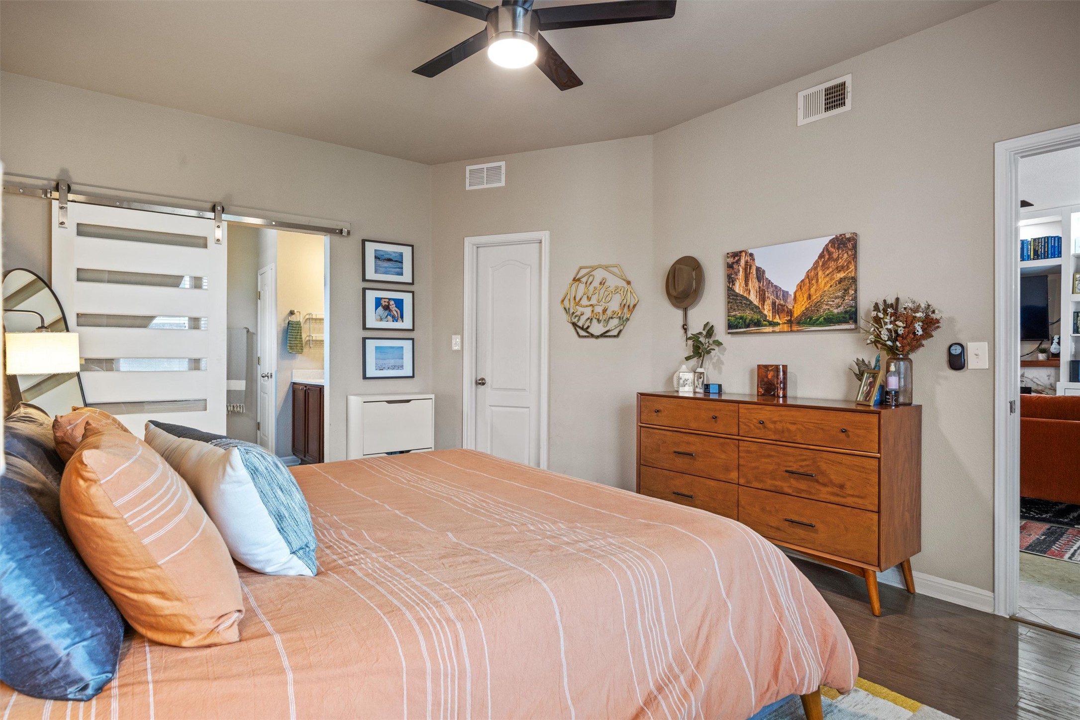1117 Nevarez Kyle, TX 78640 - Photo 24 of 32 a bedroom with a bed and a dresser