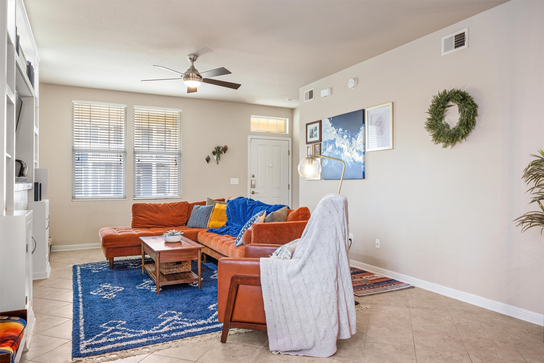 1117 Nevarez Kyle, TX 78640 - Photo 6 of 32 a living room with furniture a table and a large window