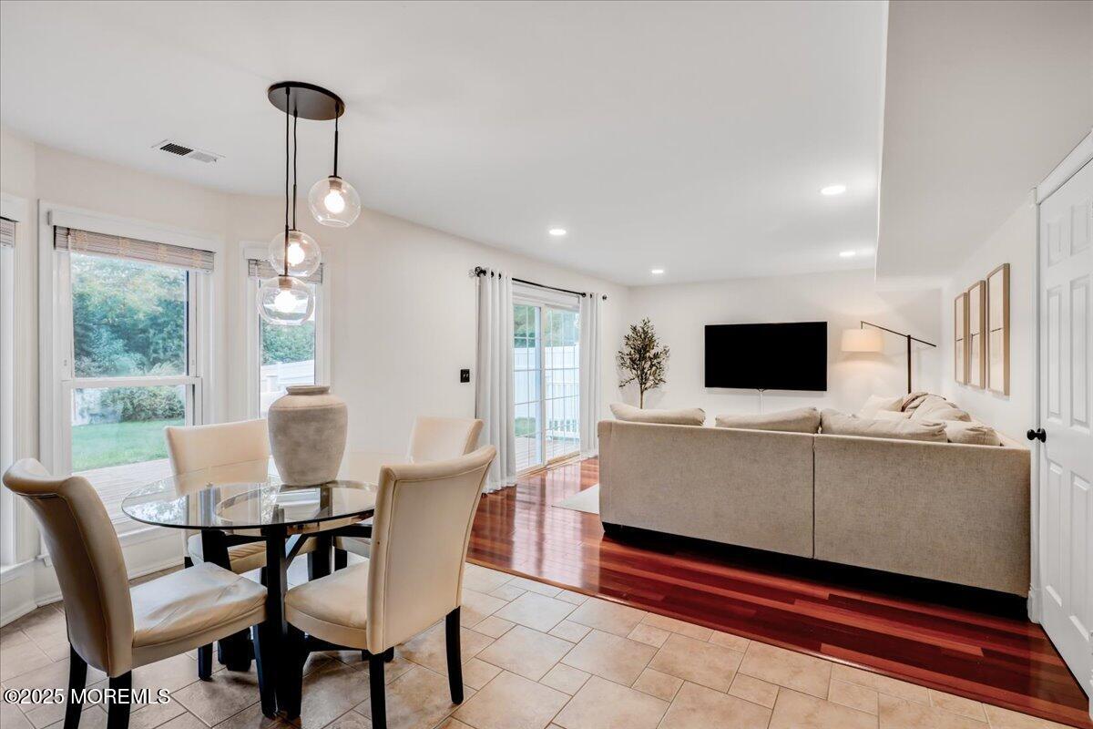 7 Hawk Court Howell, NJ 07731 - Photo 11 of 32 a living room with furniture and a flat screen tv
