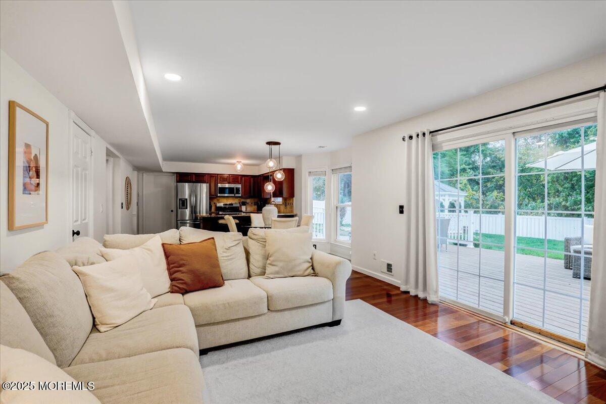 7 Hawk Court Howell, NJ 07731 - Photo 13 of 32 a living room with furniture and a large window