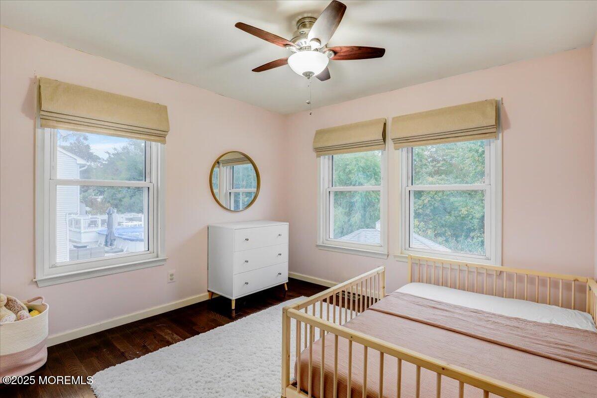 7 Hawk Court Howell, NJ 07731 - Photo 21 of 32 a bedroom with a bed and a window