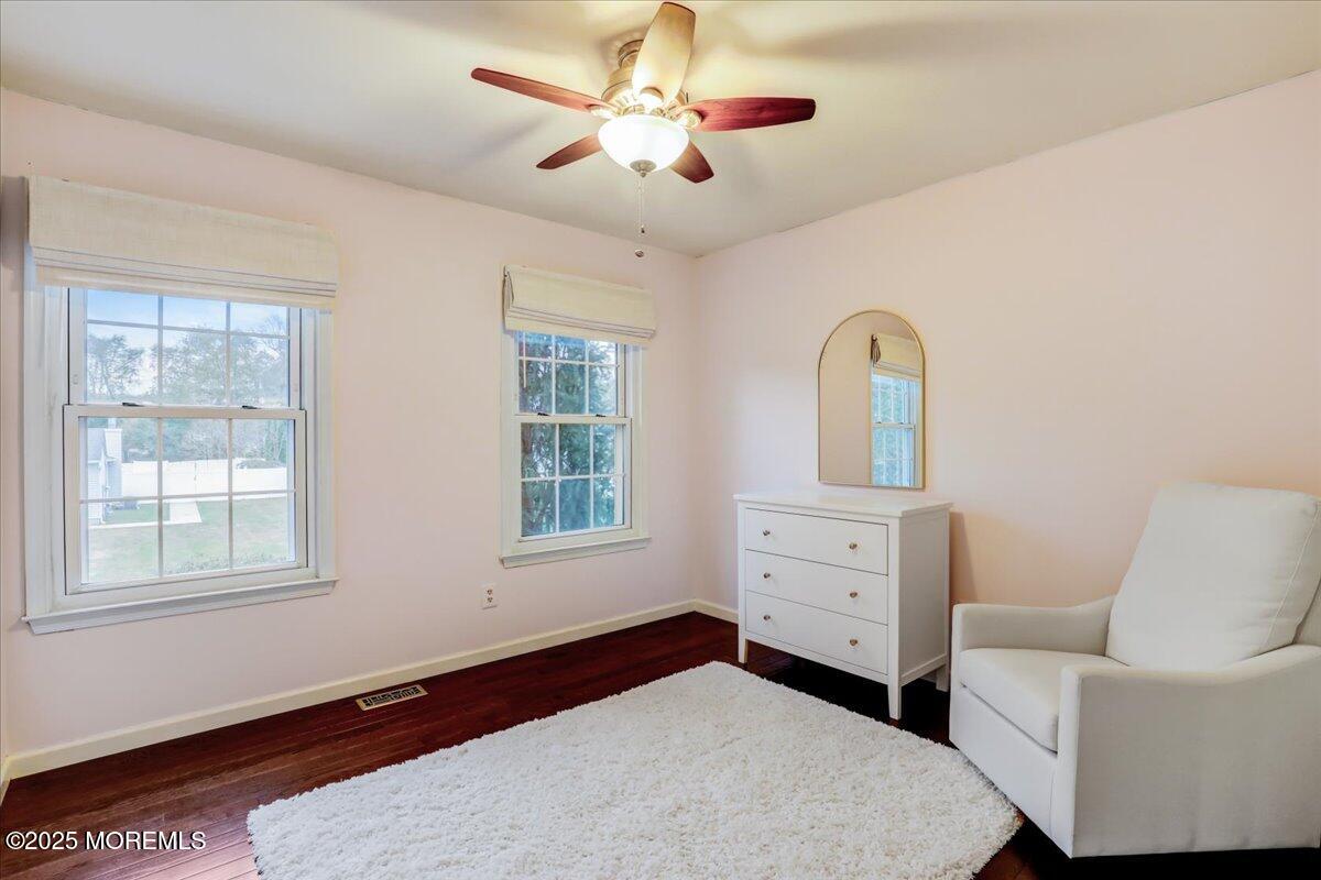 7 Hawk Court Howell, NJ 07731 - Photo 22 of 32 a bedroom with a bed and a dresser