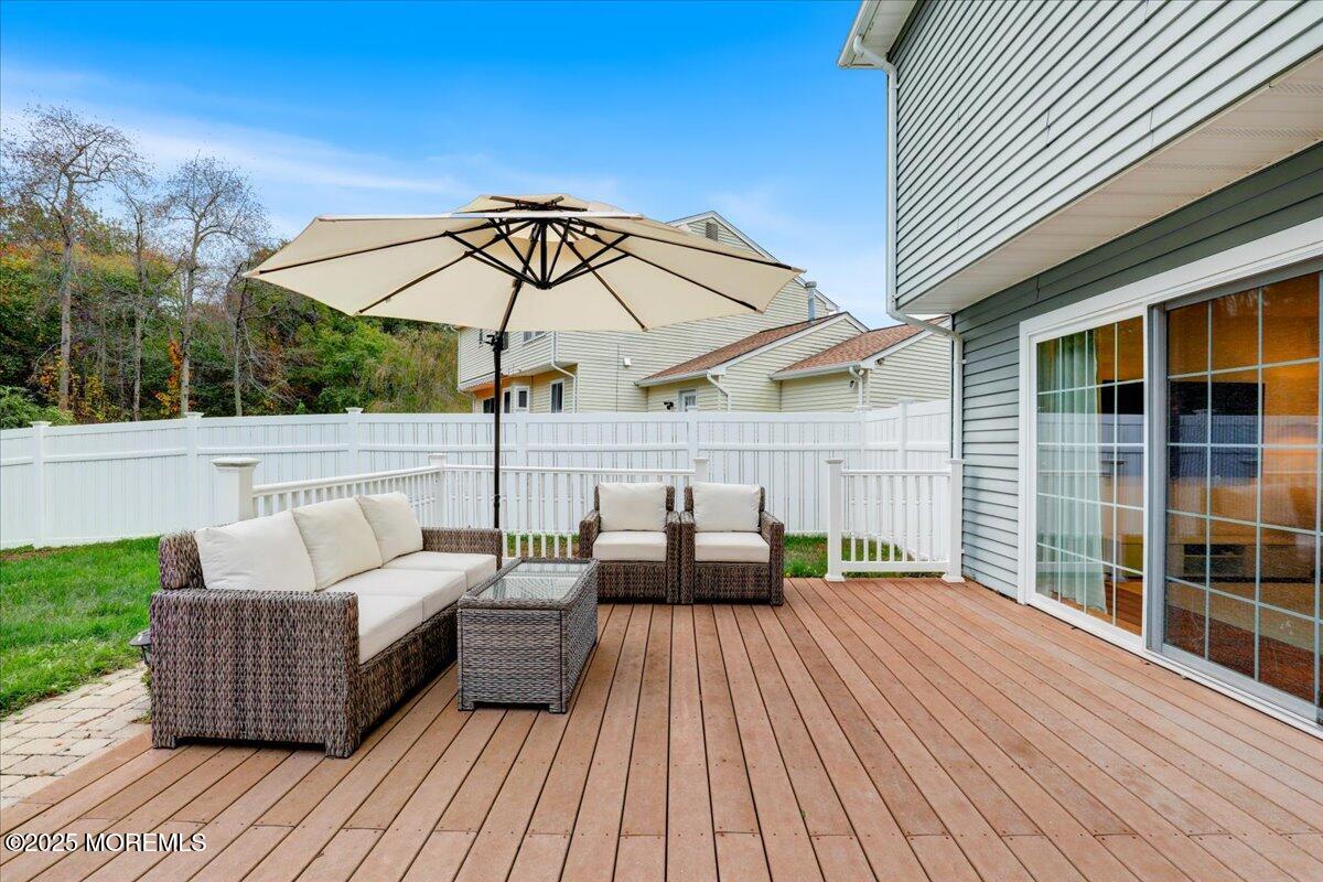 7 Hawk Court Howell, NJ 07731 - Photo 27 of 32 a view of a roof deck with couches
