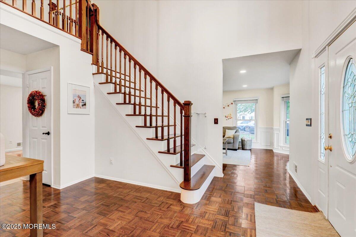 7 Hawk Court Howell, NJ 07731 - Photo 5 of 32 a view of entryway and hall with wooden floor