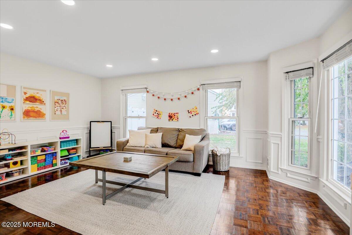 7 Hawk Court Howell, NJ 07731 - Photo 7 of 32 a living room with furniture and a wooden floor