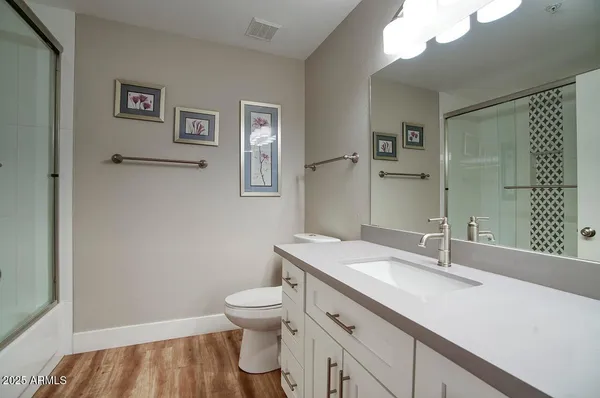 a view of a swimming pool with a patio