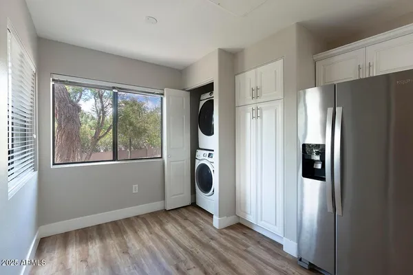 a view of a livingroom with furniture and window