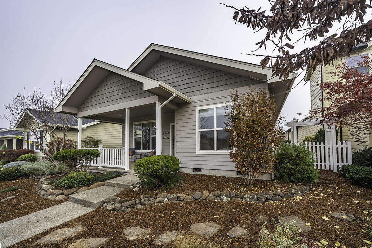 1078 North Haskell Street Central Point, OR 97502 - Photo 2 of 25 a front view of a house with garden
