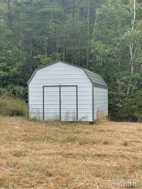 8382 Old Courthouse Road Appomattox, VA 24522 - Photo 3 of 5 a house with a yard