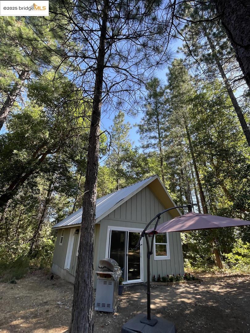 15003 Alleghany Road North San Juan, CA 95960 - Photo 3 of 27 a front view of a house with garden