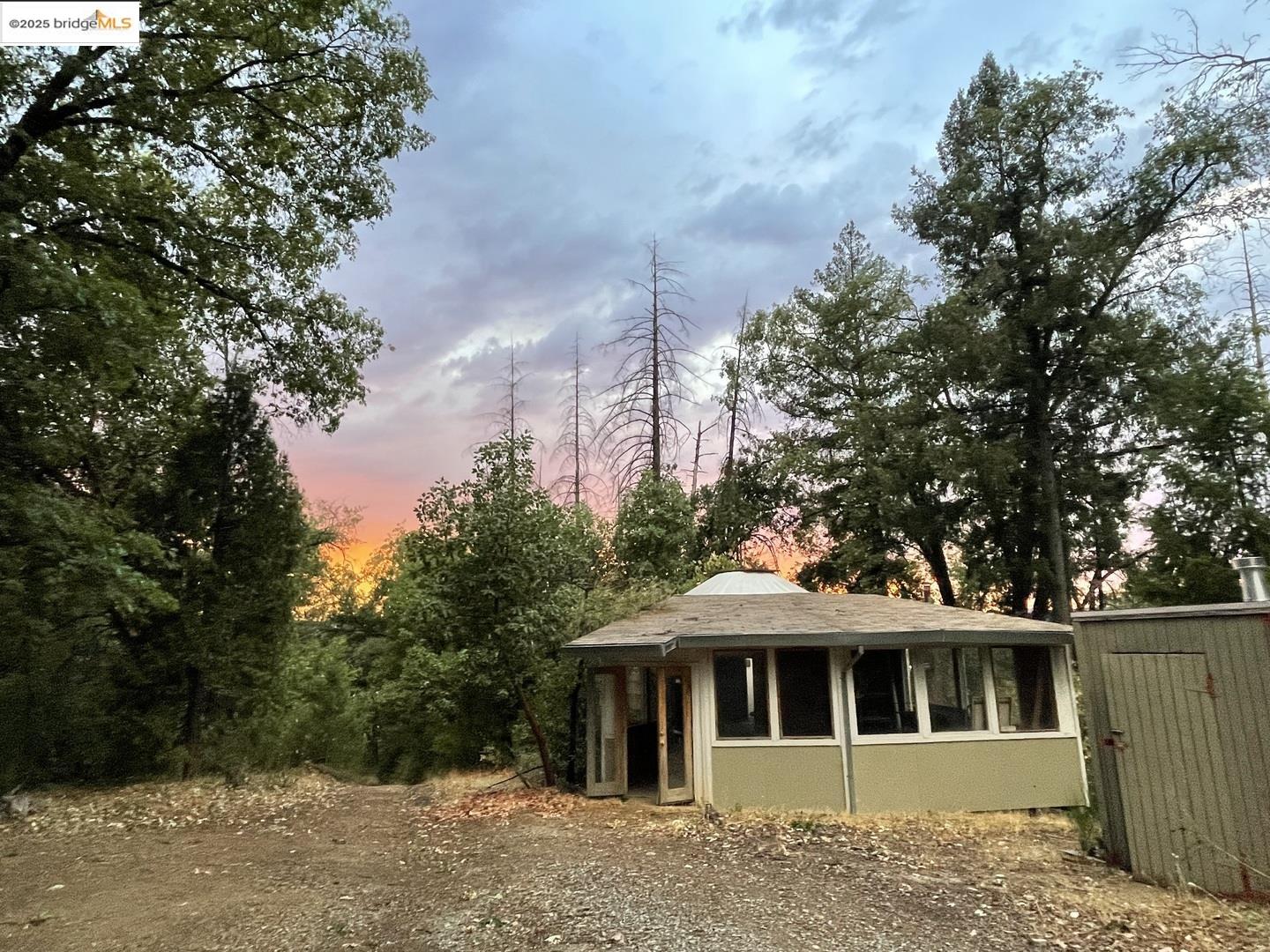 15003 Alleghany Road North San Juan, CA 95960 - Photo 7 of 27 a front view of a house with a garden