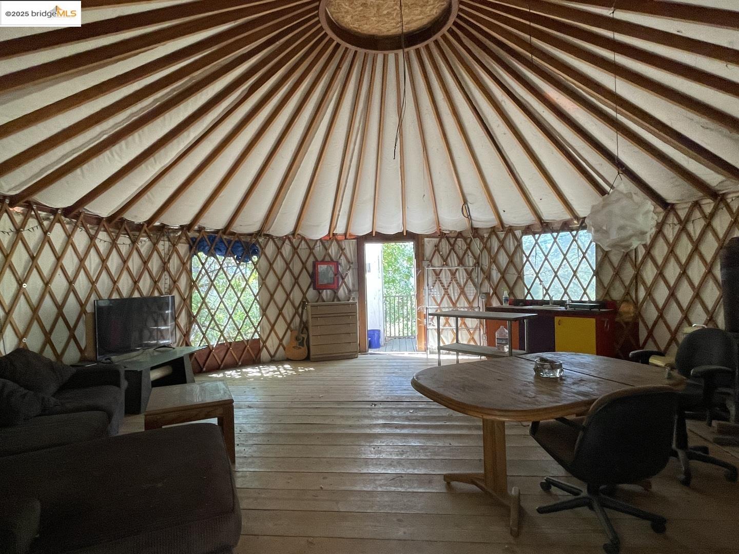 15003 Alleghany Road North San Juan, CA 95960 - Photo 8 of 27 a patio with glass table and chairs