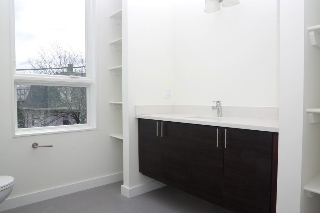 178 Thornton Street, Unit 2 Boston, MA 02119 - Photo 5 of 7 a close up of a sink and a window