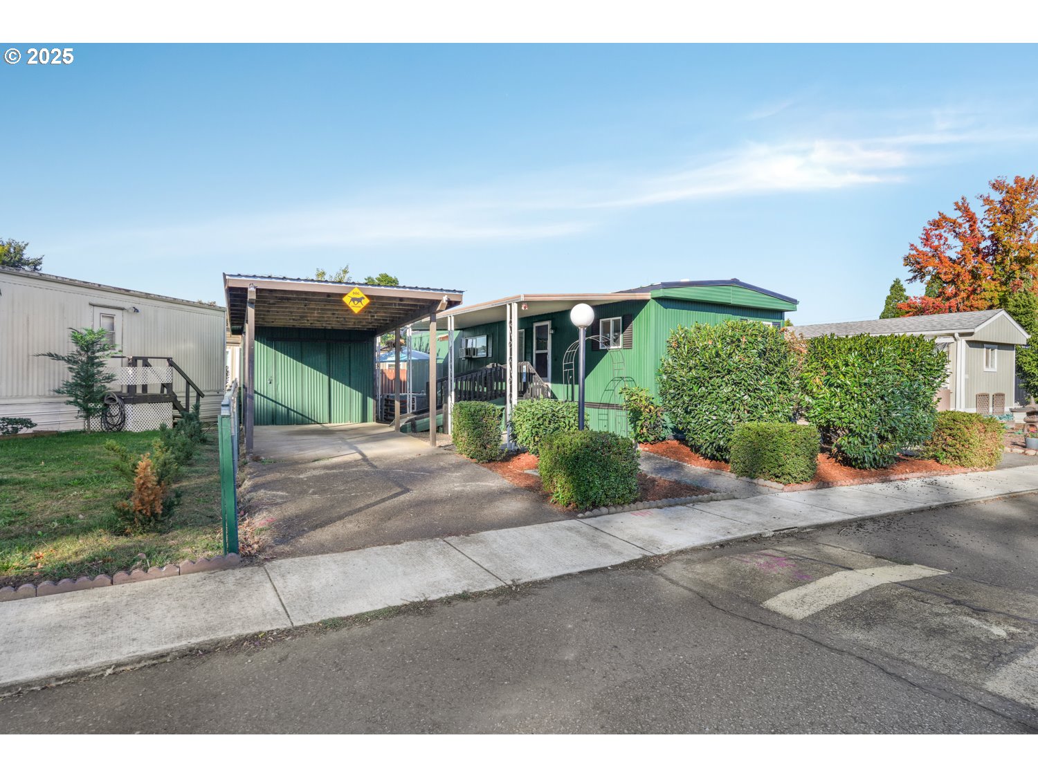 a view of house with outdoor space and sitting area