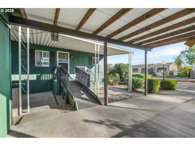 a view of a porch with furniture