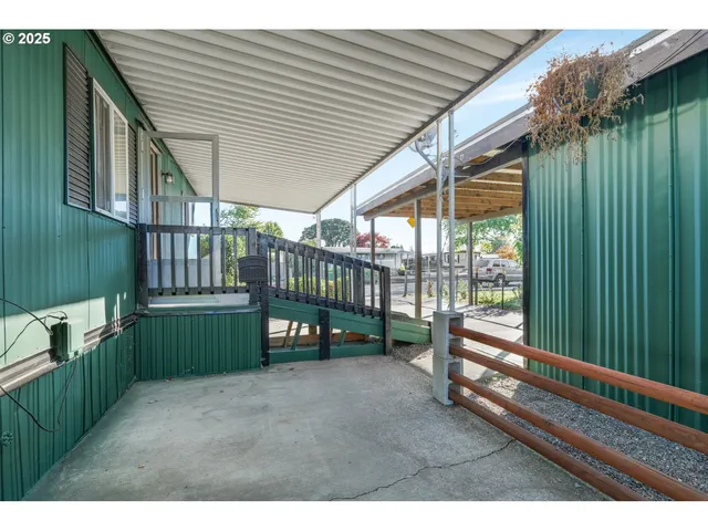 a view of a porch with furniture