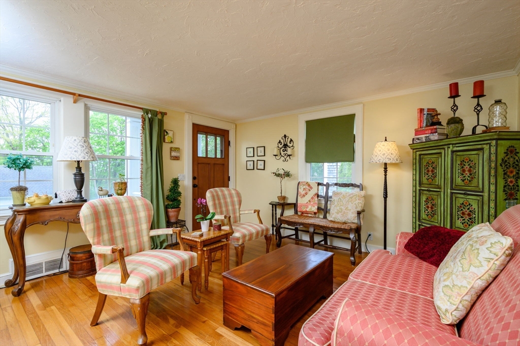 21 Rice Road Hingham, MA 02043 - Photo 2 of 40 a living room with furniture and a flat screen tv