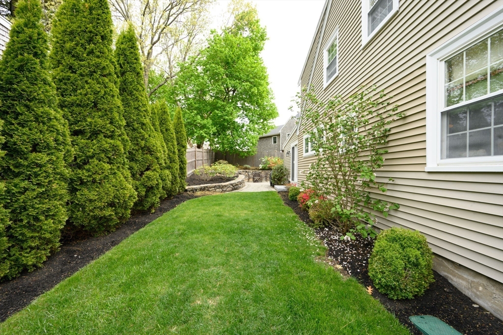 21 Rice Road Hingham, MA 02043 - Photo 25 of 40 a view of a backyard with sitting area