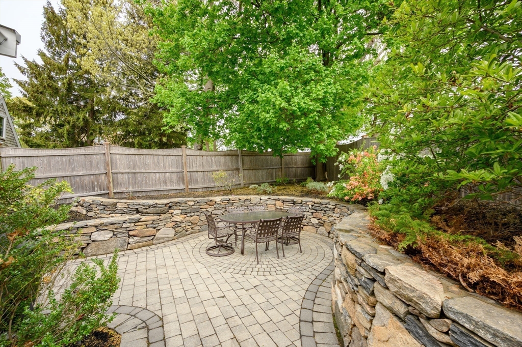 21 Rice Road Hingham, MA 02043 - Photo 27 of 40 a view of a backyard with sitting area