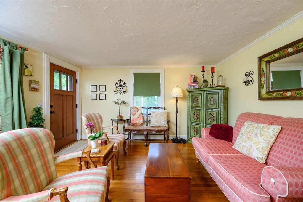 21 Rice Road Hingham, MA 02043 - Photo 3 of 40 a living room with furniture and a flat screen tv