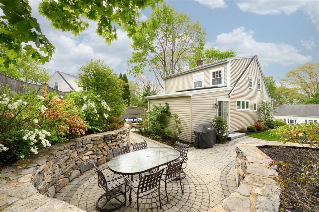 21 Rice Road Hingham, MA 02043 - Photo 31 of 40 a front view of a house with garden