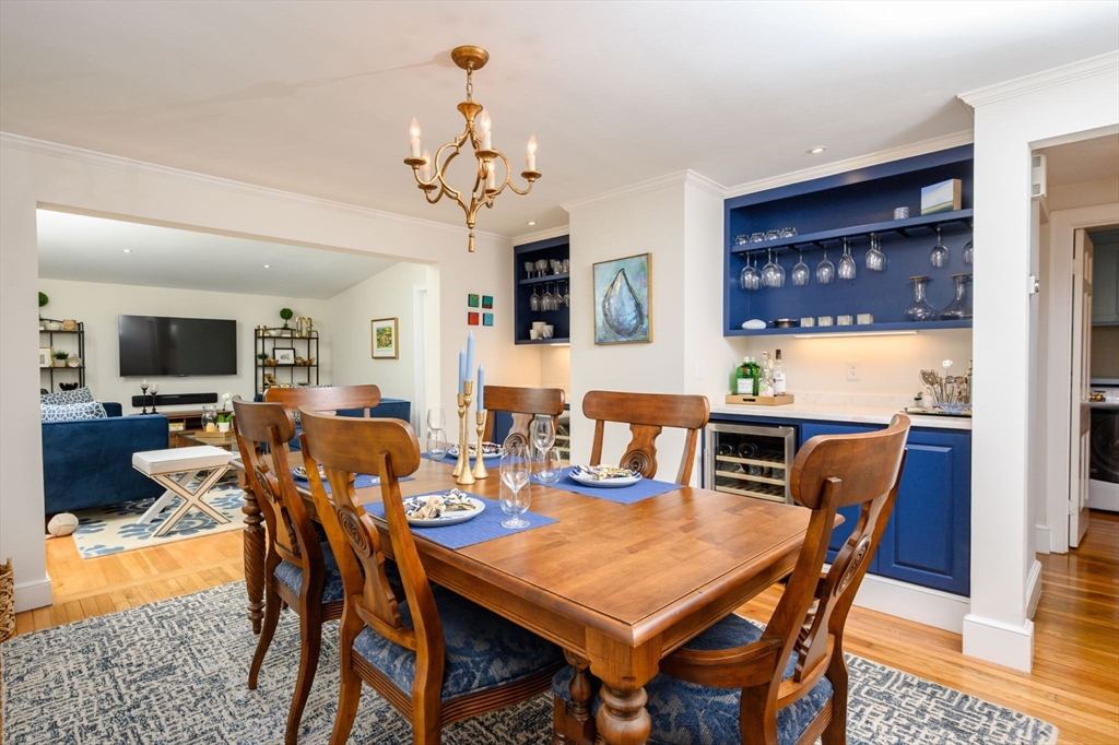 21 Rice Road Hingham, MA 02043 - Photo 8 of 40 a view of a dining room with furniture and chandelier