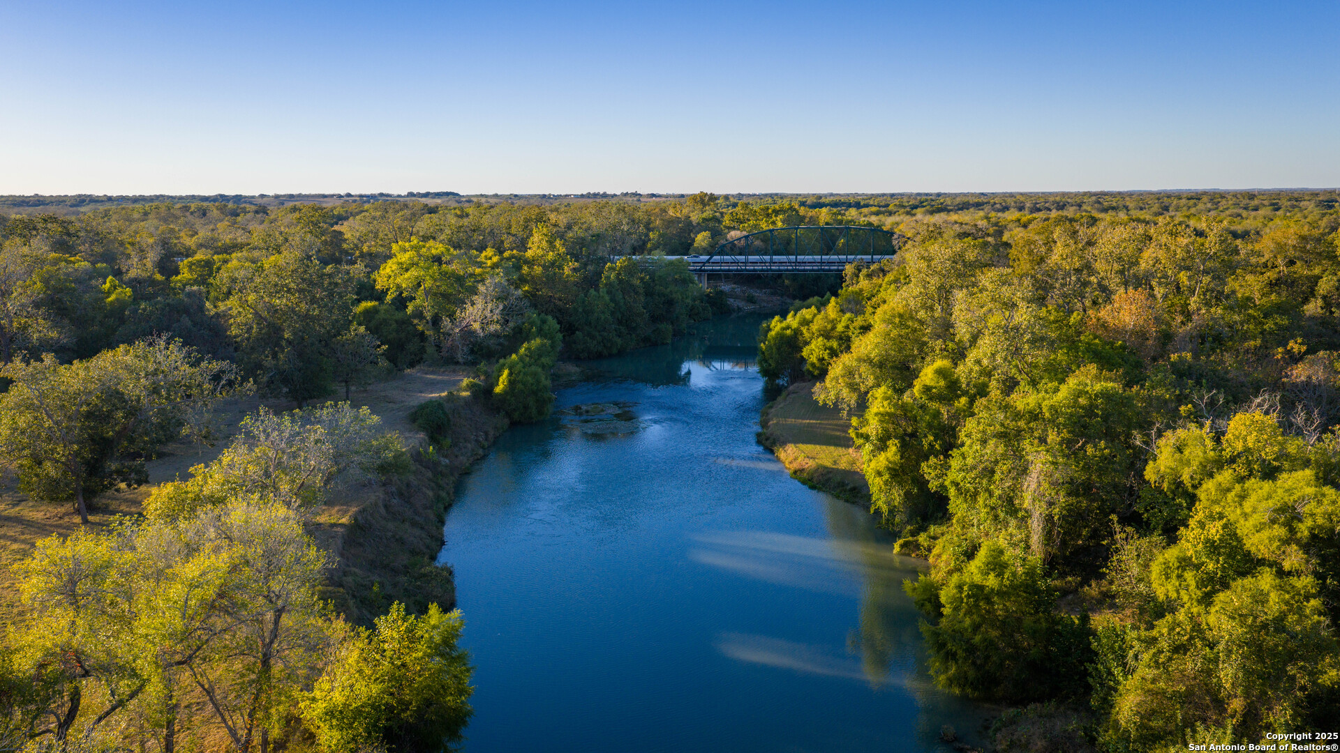 a view of a lake with a city