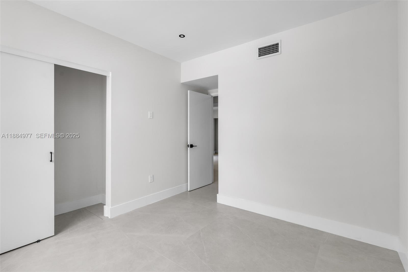 323 Northwest 104th Terrace Miami, FL 33150 - Photo 16 of 30 a view of an empty room