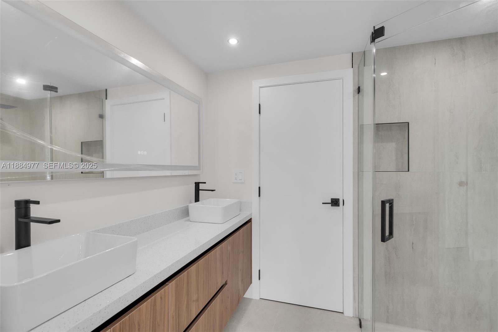 323 Northwest 104th Terrace Miami, FL 33150 - Photo 20 of 30 a kitchen with a sink and refrigerator