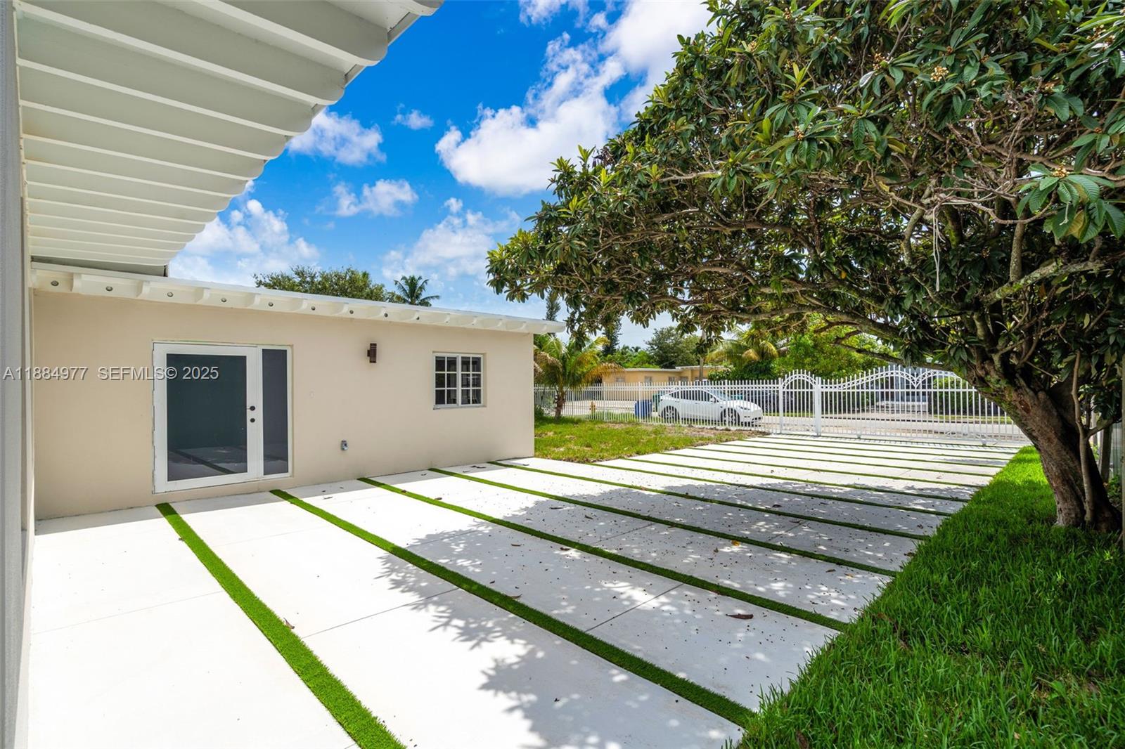 323 Northwest 104th Terrace Miami, FL 33150 - Photo 29 of 30 a view of backyard with large trees
