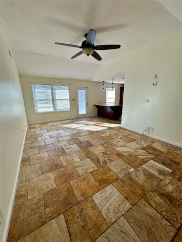 a view of an empty room and window