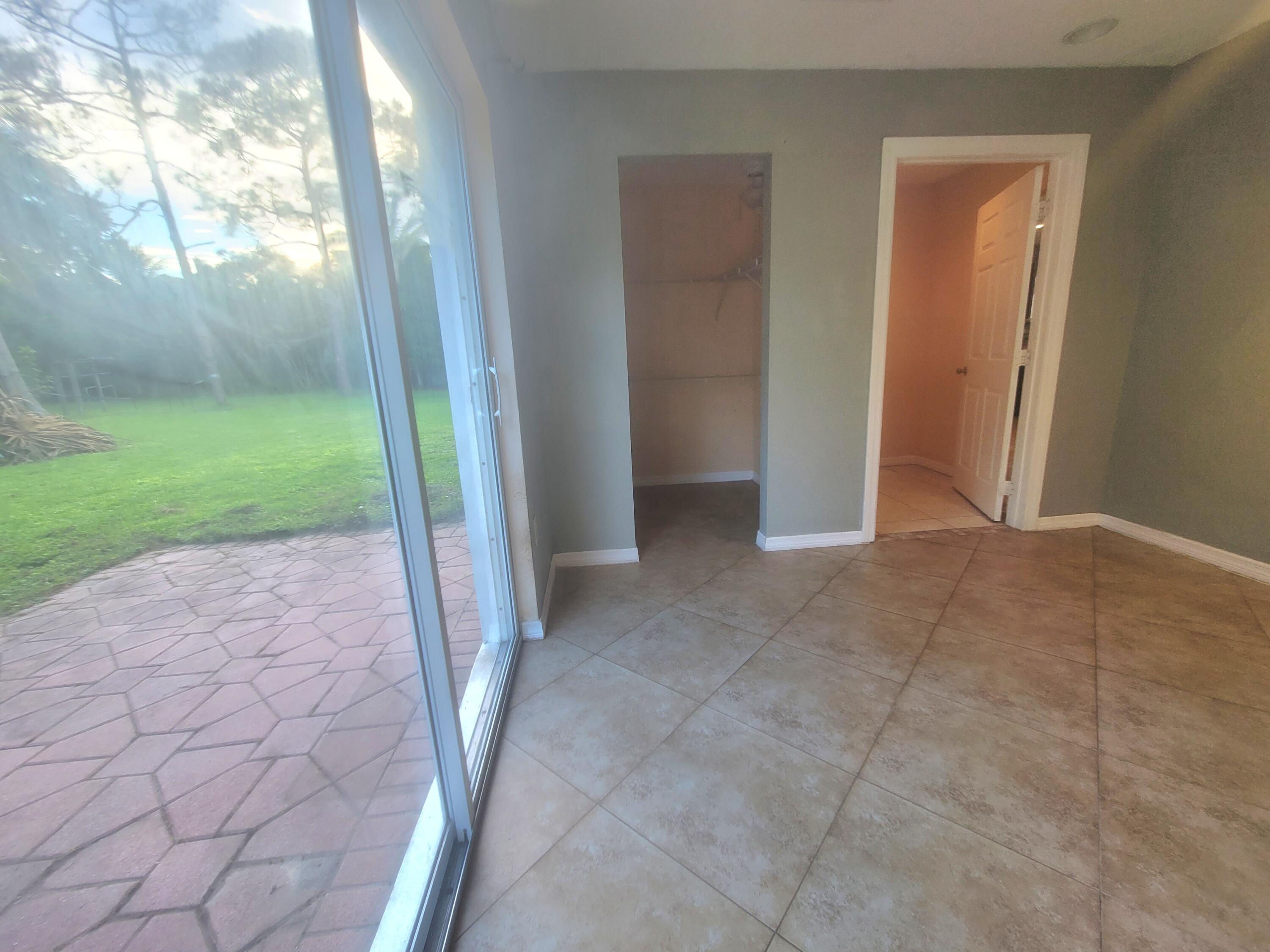 15664 N Road, Unit A Loxahatchee Groves, FL 33470 - Photo 16 of 16 a view of an outdoor space and a yard