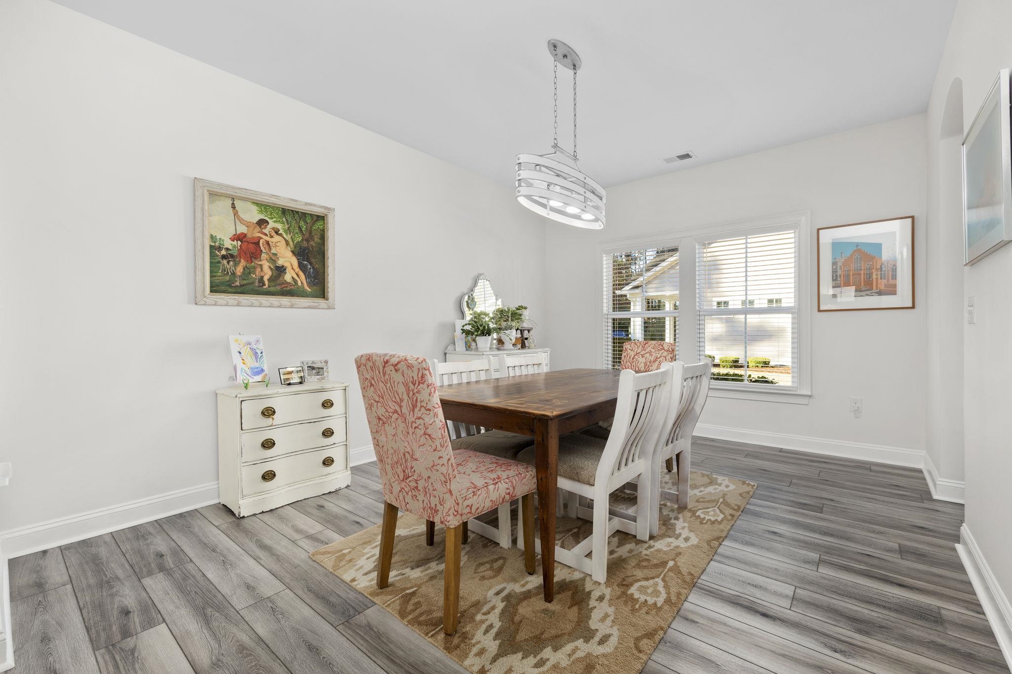 1704 Edgewood Drive Myrtle Beach, SC 29577 - Photo 14 of 40 Dining area with baseboards and light wood-type flooring