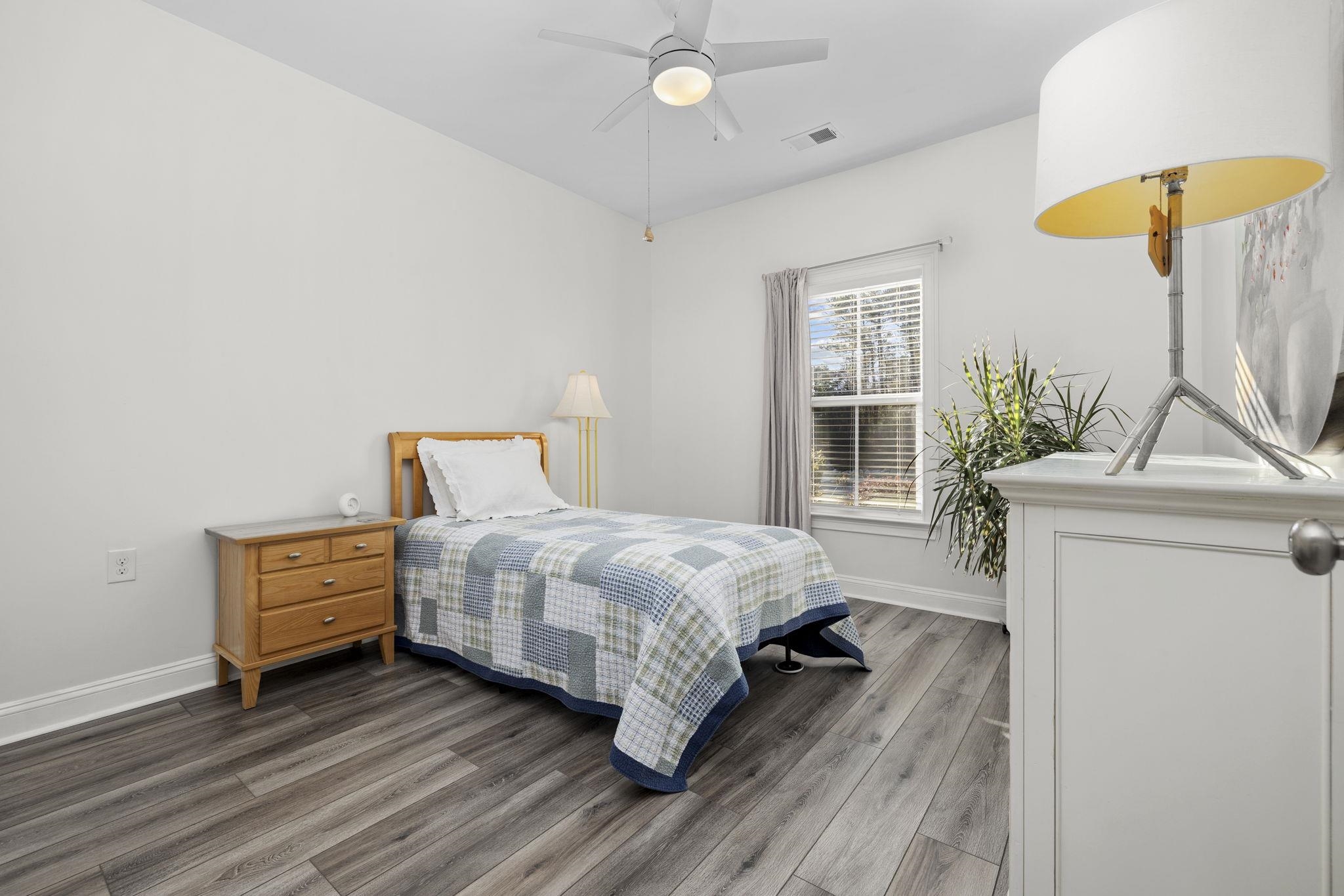 1704 Edgewood Drive Myrtle Beach, SC 29577 - Photo 23 of 40 Bedroom featuring light wood-style flooring and ceiling fan