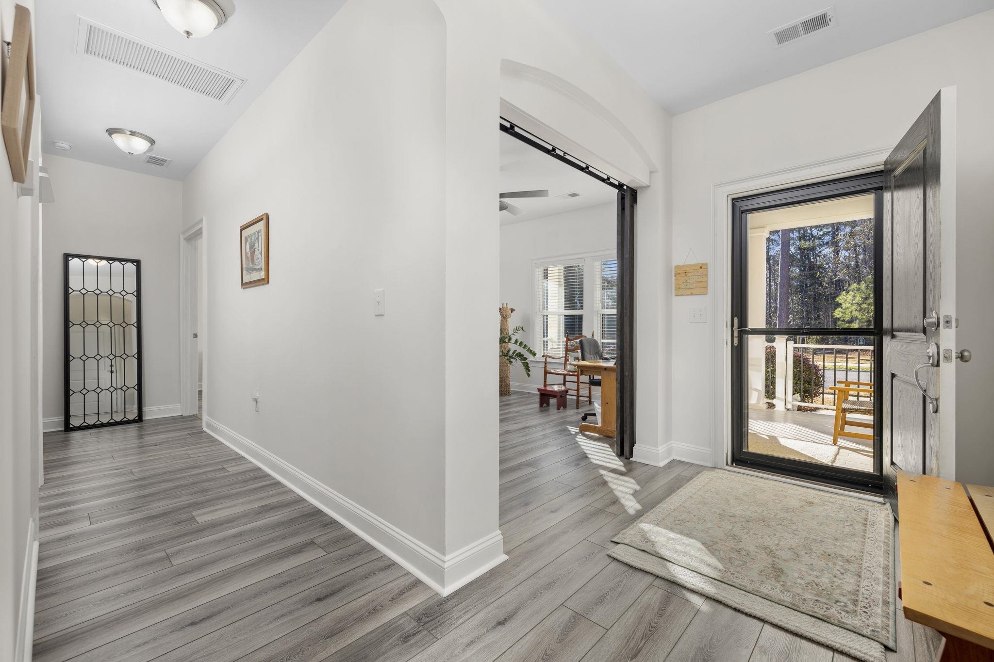 1704 Edgewood Drive Myrtle Beach, SC 29577 - Photo 5 of 40 Entrance foyer with baseboards and light wood finished floors