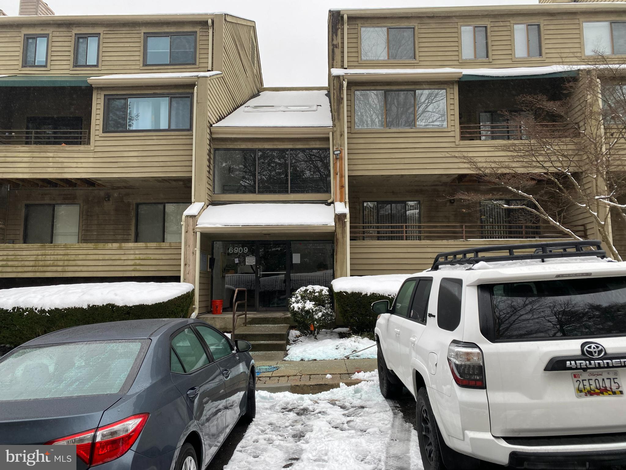6909 Jones View Drive, Unit 3C Baltimore, MD 21209 - Photo 1 of 17 a view of house with outdoor seating