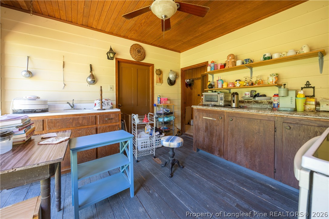 6346 Dunn Road Roseboro, NC 28382 - Photo 15 of 39 a dining room with furniture and a floor to ceiling window