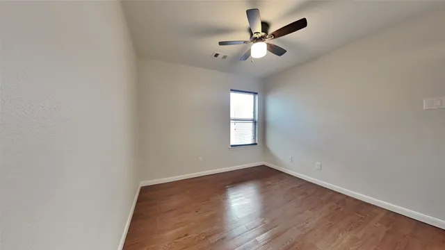 a bathroom with a bathtub and a sink