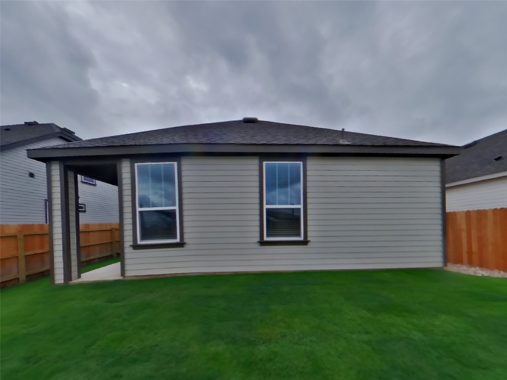 609 Foxtail Agave Street Leander, TX 78641 - Photo 15 of 29 a backyard of a house with lots of green space