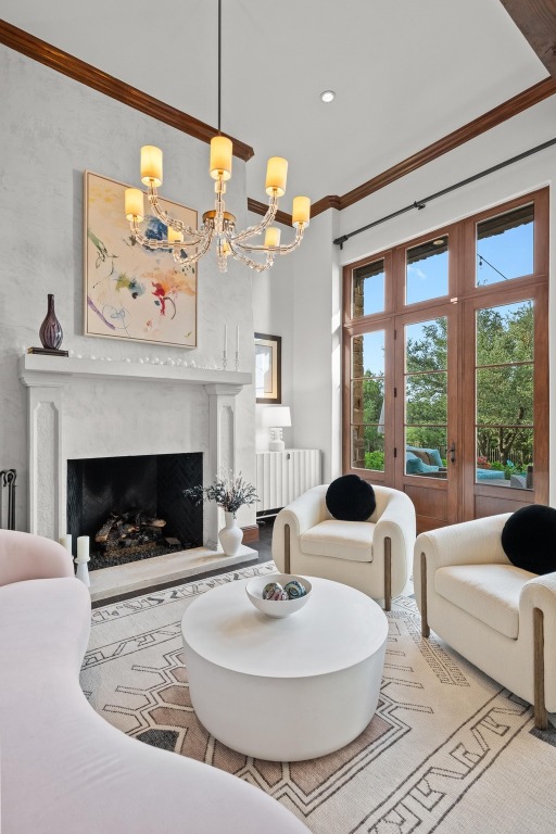 12724 Little Blue Austin, TX 78738 - Photo 12 of 40 a living room with furniture a fireplace and a large window