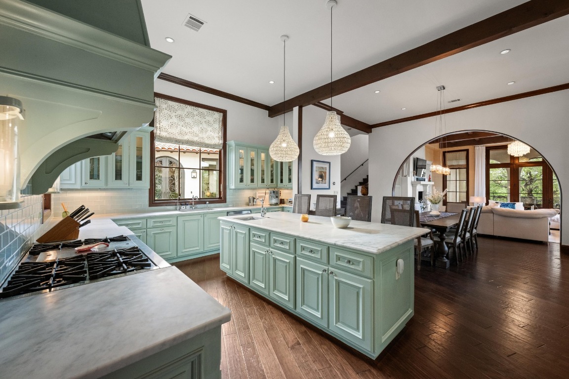 12724 Little Blue Austin, TX 78738 - Photo 19 of 40 a living room with furniture a table tennis table and a large window