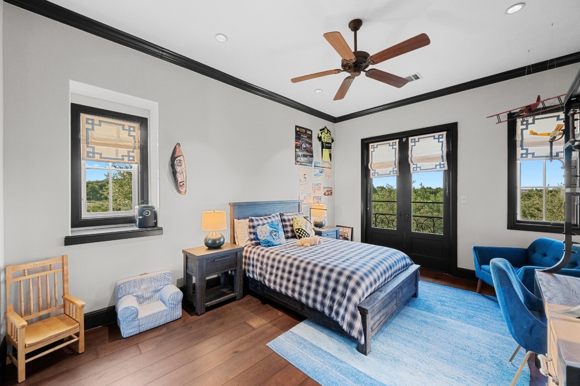 12724 Little Blue Austin, TX 78738 - Photo 33 of 40 a bedroom with a bed and a window