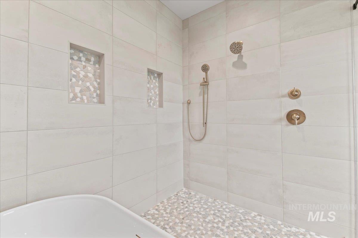 9580 South Prairie Falcon Avenue Nampa, ID 83686 - Photo 30 of 50 Full bathroom with a tile shower and a soaking tub