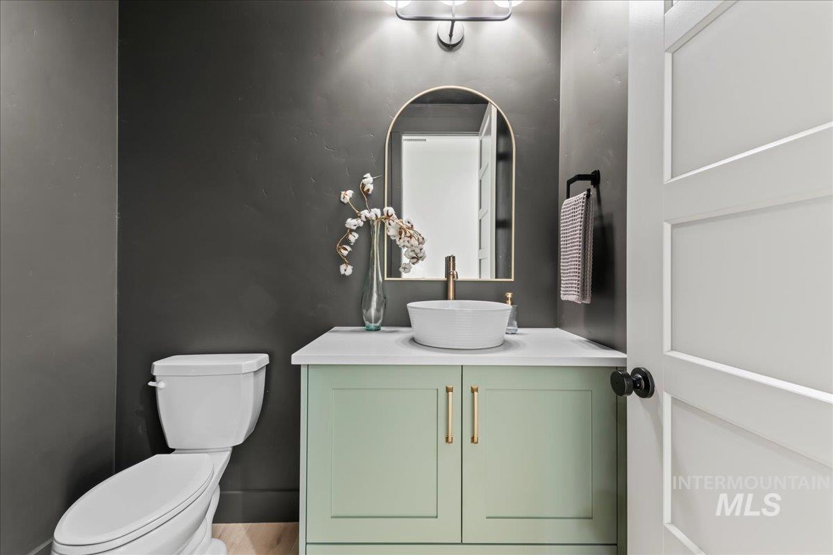 9580 South Prairie Falcon Avenue Nampa, ID 83686 - Photo 33 of 50 Half bath featuring vanity and toilet