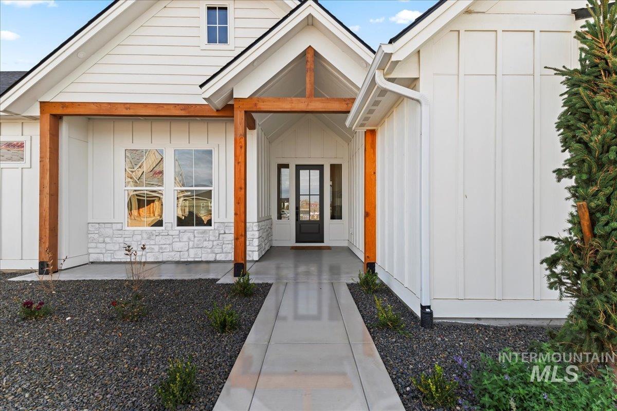 9580 South Prairie Falcon Avenue Nampa, ID 83686 - Photo 4 of 50 Entrance to property featuring board and batten siding