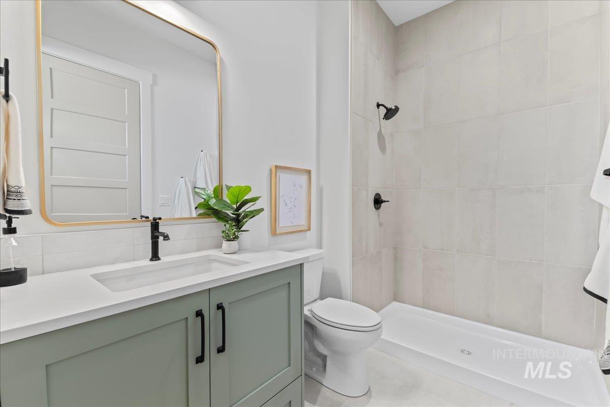9580 South Prairie Falcon Avenue Nampa, ID 83686 - Photo 41 of 50 Bathroom with vanity and a shower stall